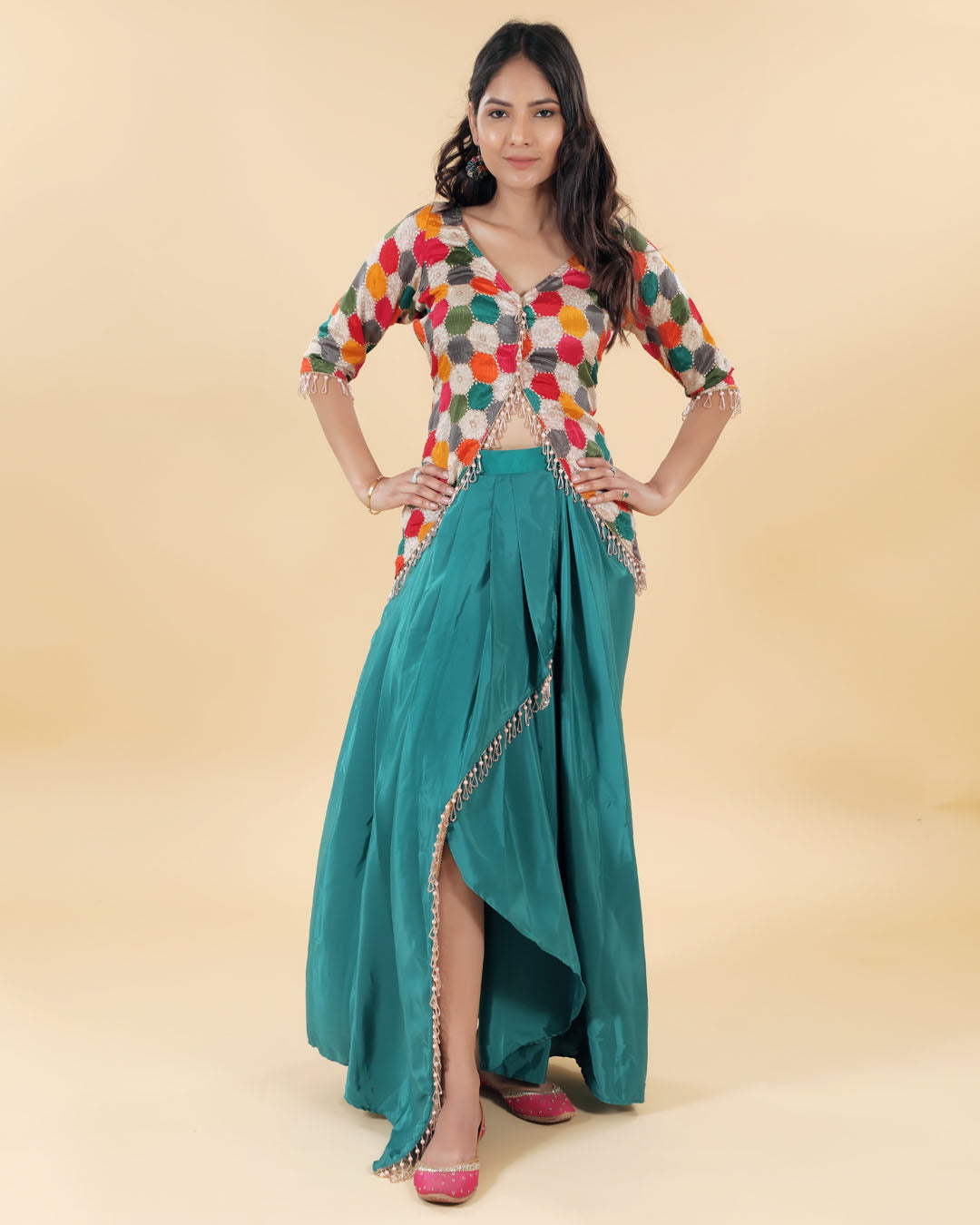 Green slit skirt with multicolour cut blouse