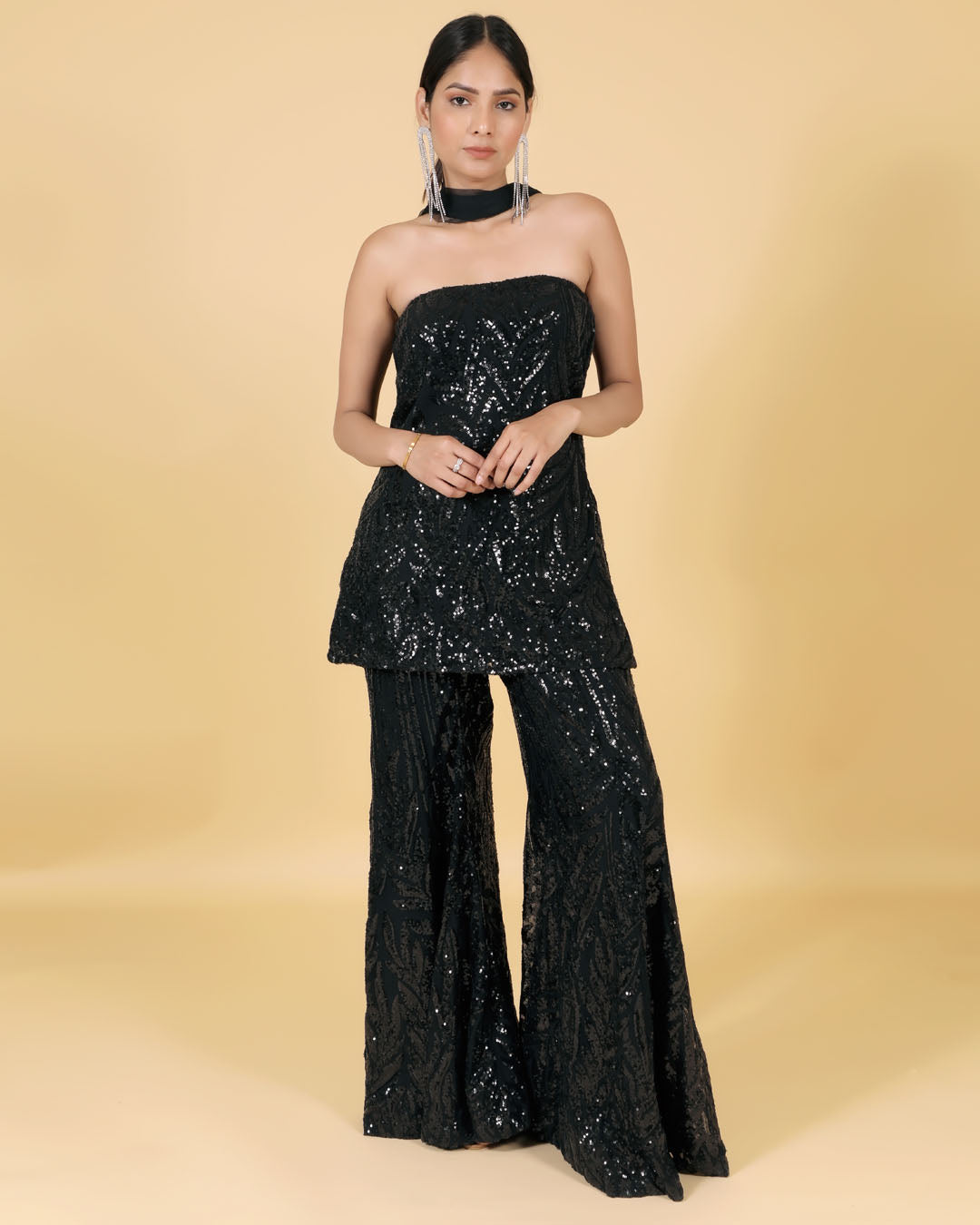 Black handwork tube top with flared pants and short net dupatta