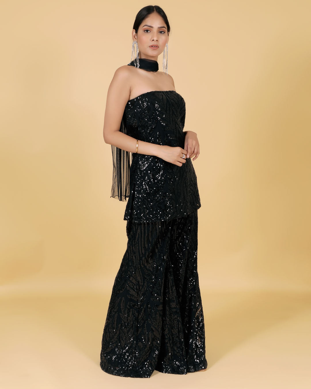 Black handwork tube top with flared pants and short net dupatta