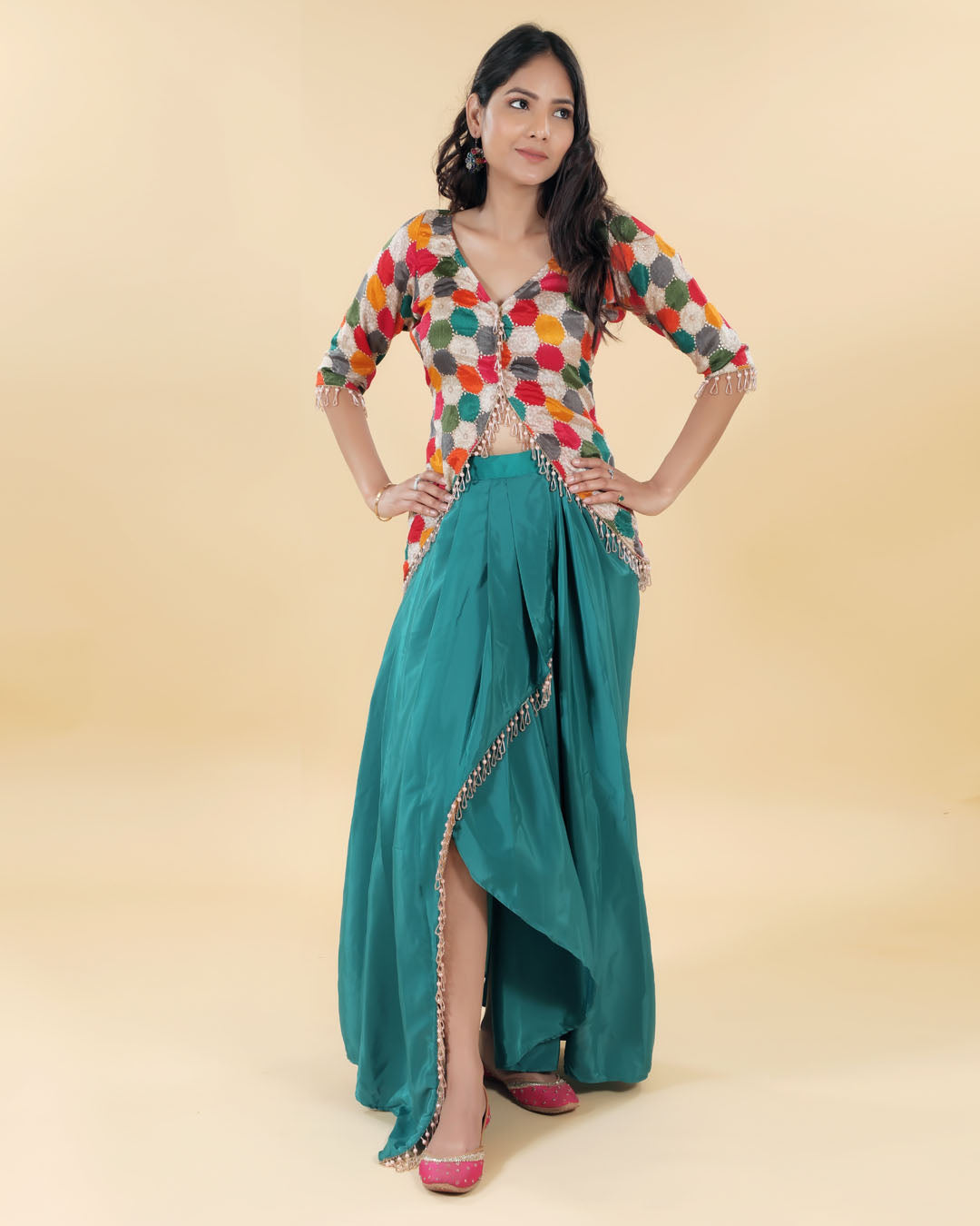 Green slit skirt with multicolour cut blouse
