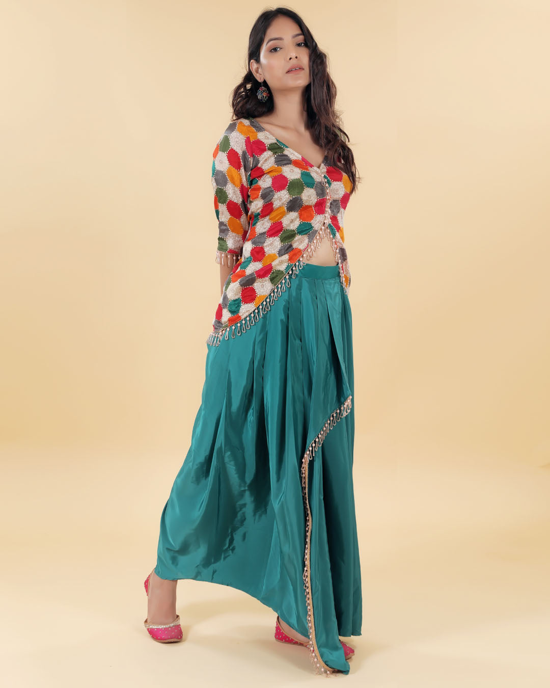 Green slit skirt with multicolour cut blouse