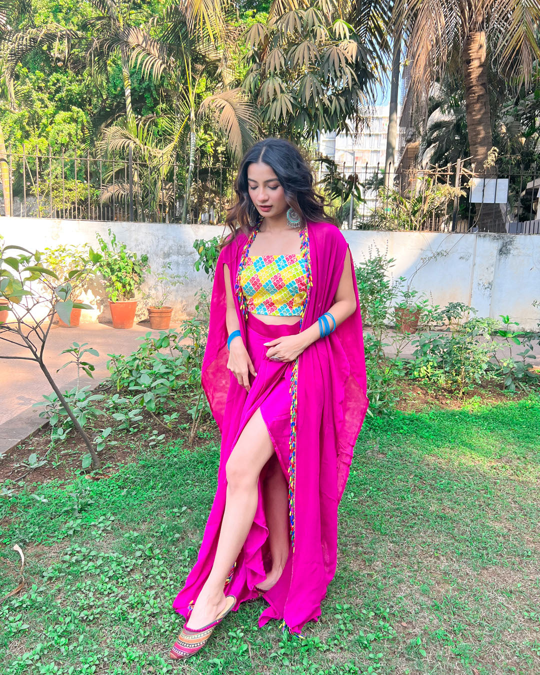 Pink 2 piece set with multicolour crop top and detailing on the shrug